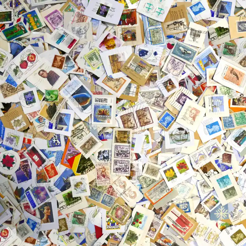 Tous pays timbres sur fragments au kilo. Garantie Incluse